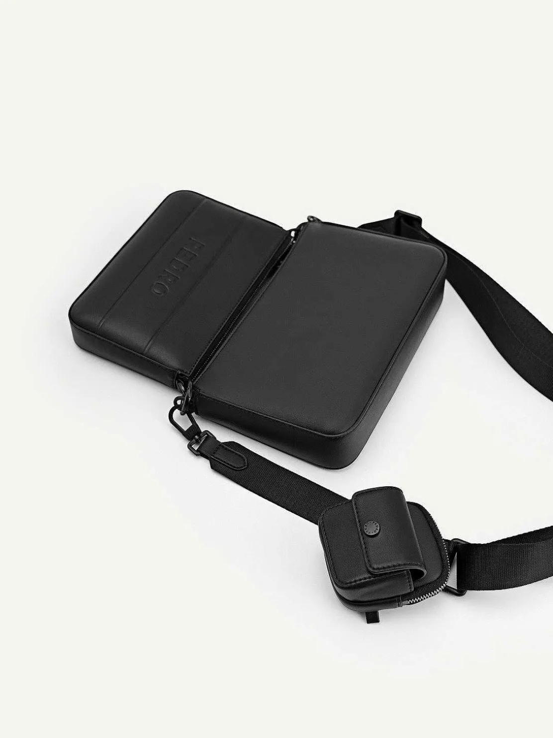 Frank Sling Bag With Earphone Holder